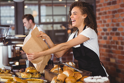 Woman serving pastries